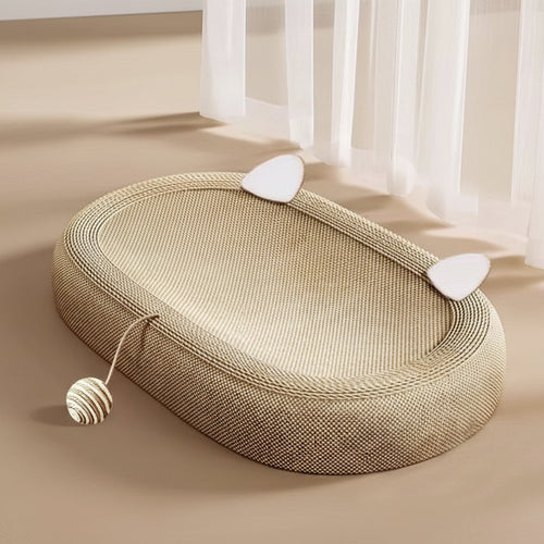 Round woven pet bed with catnip on a beige surface