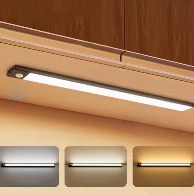 Under-cabinet LED light strip with three color options on a wooden background